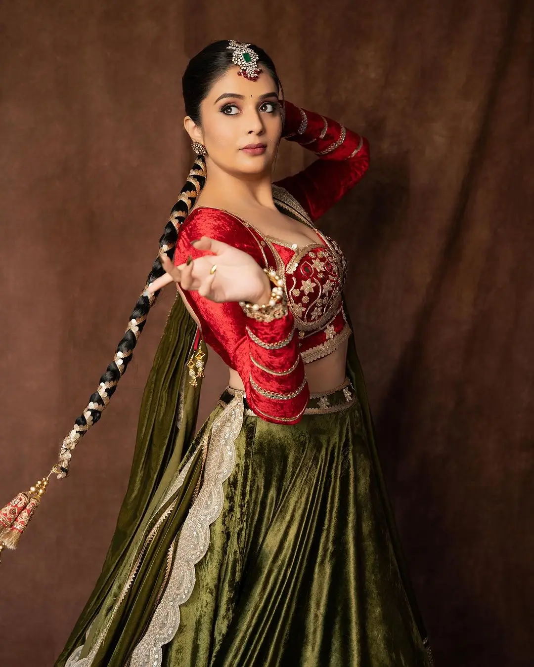 Indian TV Actress Sreemukhi in Traditional Green Lehenga Red Choli